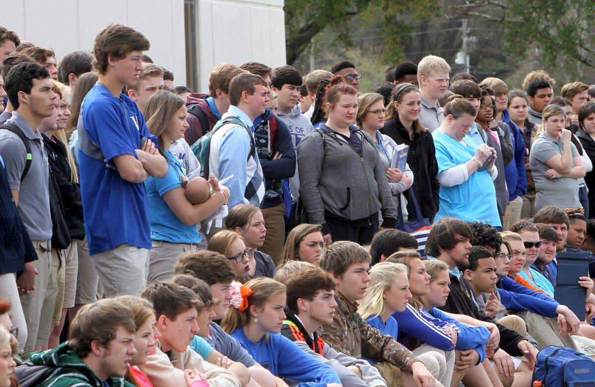 Vancleave High School students dressed according to the old uniform policy are seen watching a car accident re-enactment Tuesday, March 8, 2016. The Jackson County School District announced it would shift to a dress code, rather than uniforms, in the 2025-26 school year.