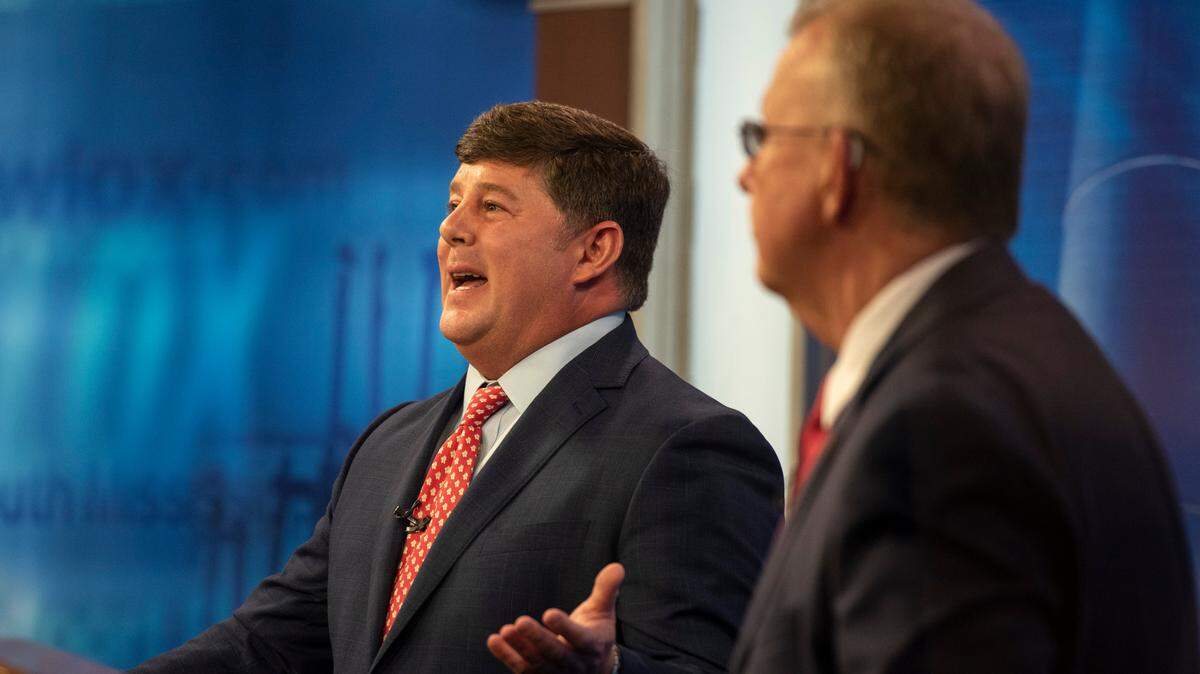 Former U.S. Rep. Steven Palazzo, left, is pictured in a 2022 campaign debate with Mike Ezell, who won the race and now serves as Mississippi’s 4th District representative.