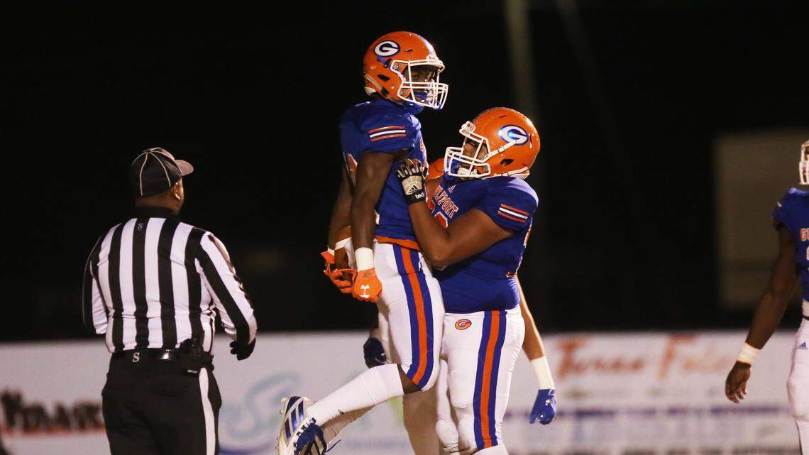 Gulfport wide receiver Tommie Johnson scores in the first quarter against George County in the first round of the playoffs November 15, 2019.