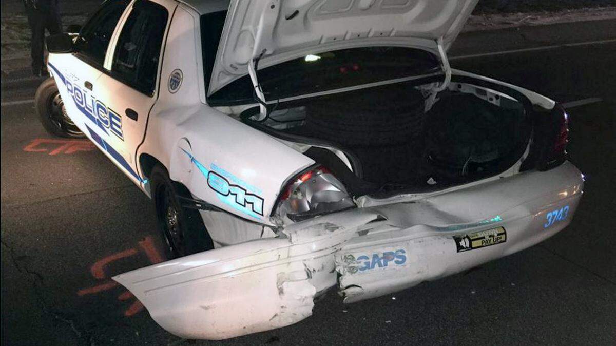GULFPORT POLICE 
 
 A photo shows damage sustained to a Gulfport patrol car on Wednesday night. Three patrol cars crashed en route to a call. Two officers suffered minor injuries.
