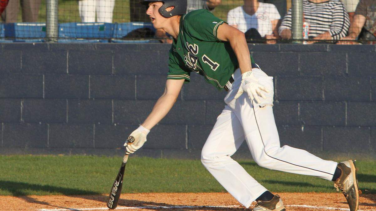 JOHN FITZHUGH/SUN HERALD 
 St. Patric's Blaise Butirich watches his two RBI hit in the first inning of their 3A baseball playoff game against St Andrew's at St. Patrick on Friday May 6, 2016.