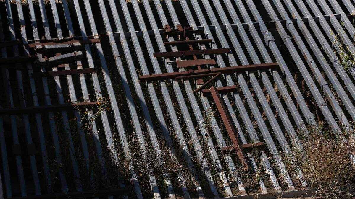 People trying to cross through the border wall even try to cut through the grating in storm drain channels. Repairing the cuts in the border fence is an every day of the year job. People use all method of tools to deal with the variations in fencing constructed by the Border Patrol. Often times someone will run up to the fence, cut a hole and retreat to wait and see if they've been detected or not before signaling for a group that the coast is clear. (Peggy Peattie/San Diego Union-Tribune/TNS)