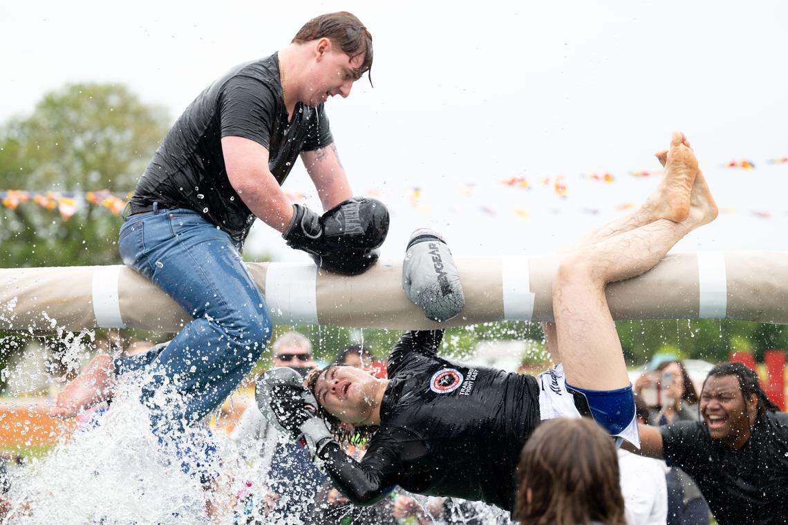 Attendees participate in Thai water boxing during Songkran at the Wat Buddhametta Mahabaramee in Gautier on Sunday, April 19, 2026.