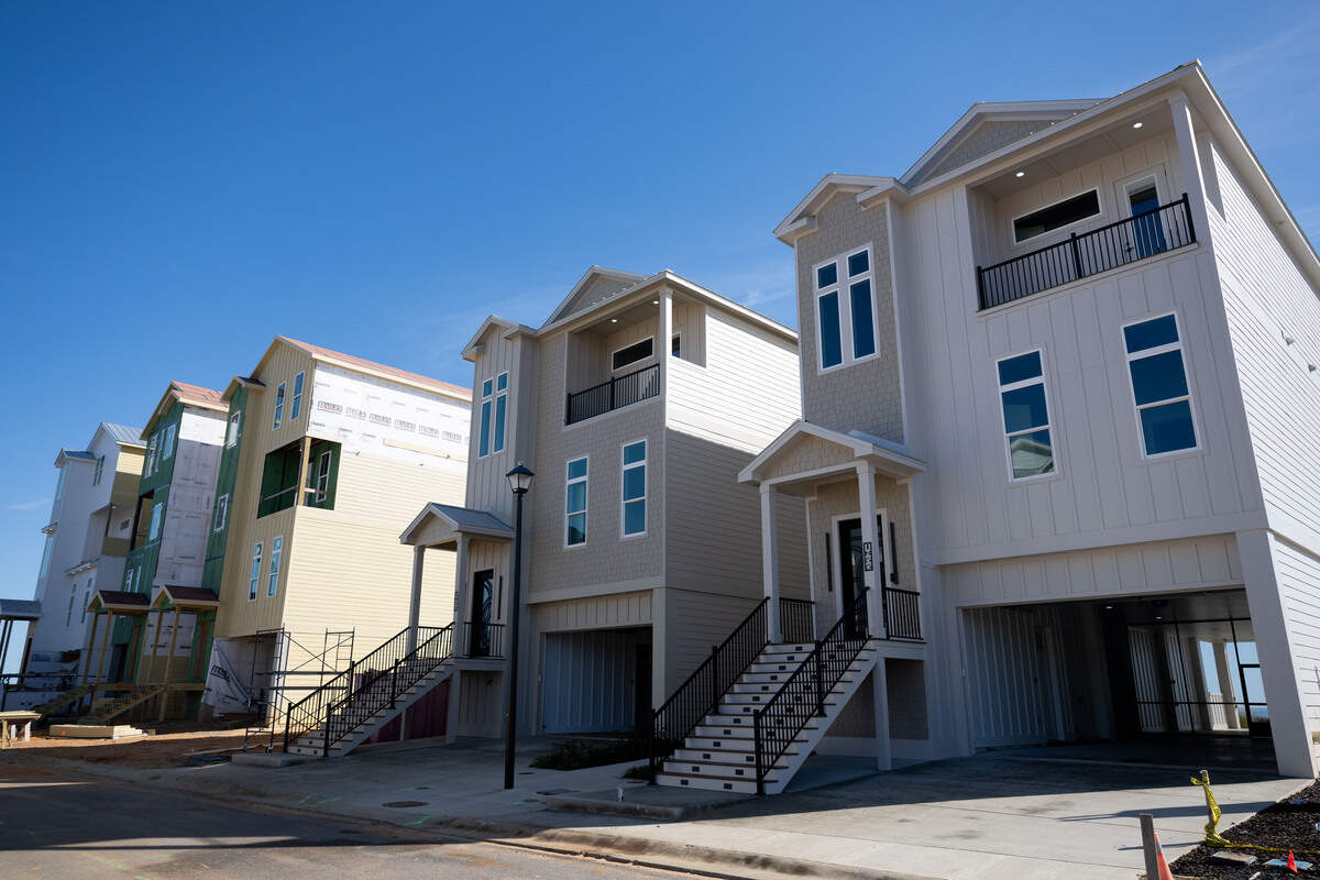 A line of homes in the new Cristiano Boardwalk subdivision south of Beach Boulevard in Biloxi. Four of the homes have been completed, with others still under construction and lots available in the 16-lot subdivision that backs up to a stretch of public sand beach with a boardwalk.