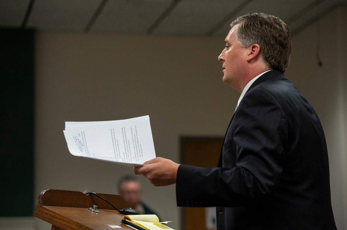 Assistant District Attorney Justin Lovorn holds his notes while cross-examining Jacob Blair Scott, who is accused of sexually assaulting a minor, during Scott’s trial in Jackson County Circuit Court in Pascagoula on Wednesday, June 1, 2022.