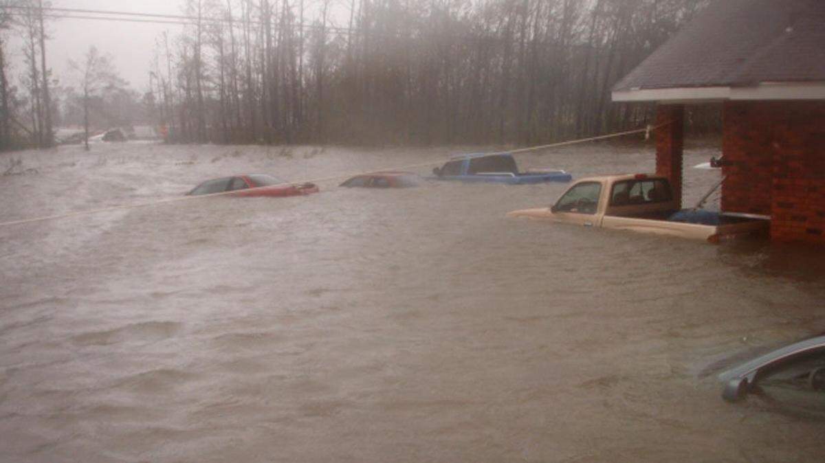 The storm surge from Hurricane Katrina came over the eave of the roof at the Apostolic Church of Our Lord Jesus at Avenue B and Kiln-Waveland Cutoff Road in Waveland. As the water receded, it revealed the cars that belonged to the 20 people who had sought refuge in the church.