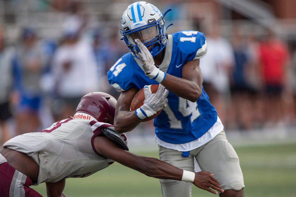 Ocean Springs John Paul Coulter gets tackled by Picayune during a spring game at Greyhound Stadium in Ocean Springs on Friday, May 13, 2022.