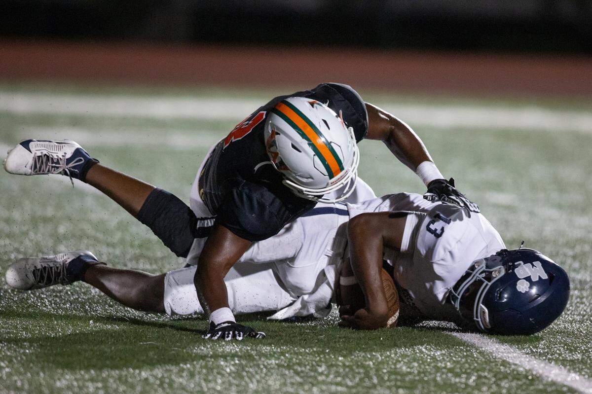 Moss Point’s KeVon Ford gets tackled during a game against West Harrison at West Harrison High School in Gulfport on Friday, Sept. 22, 2023.