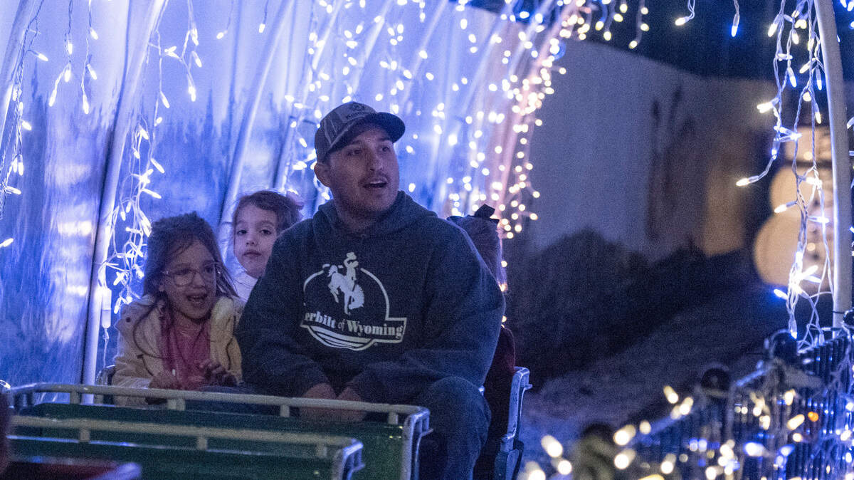 Families ride the outdoor train during a preview night for TrainTastic’s Holiday Lights event at TrainTastic Interactive Model Railroad Museum in Gulfport on Wednesday, Dec. 4, 2024.