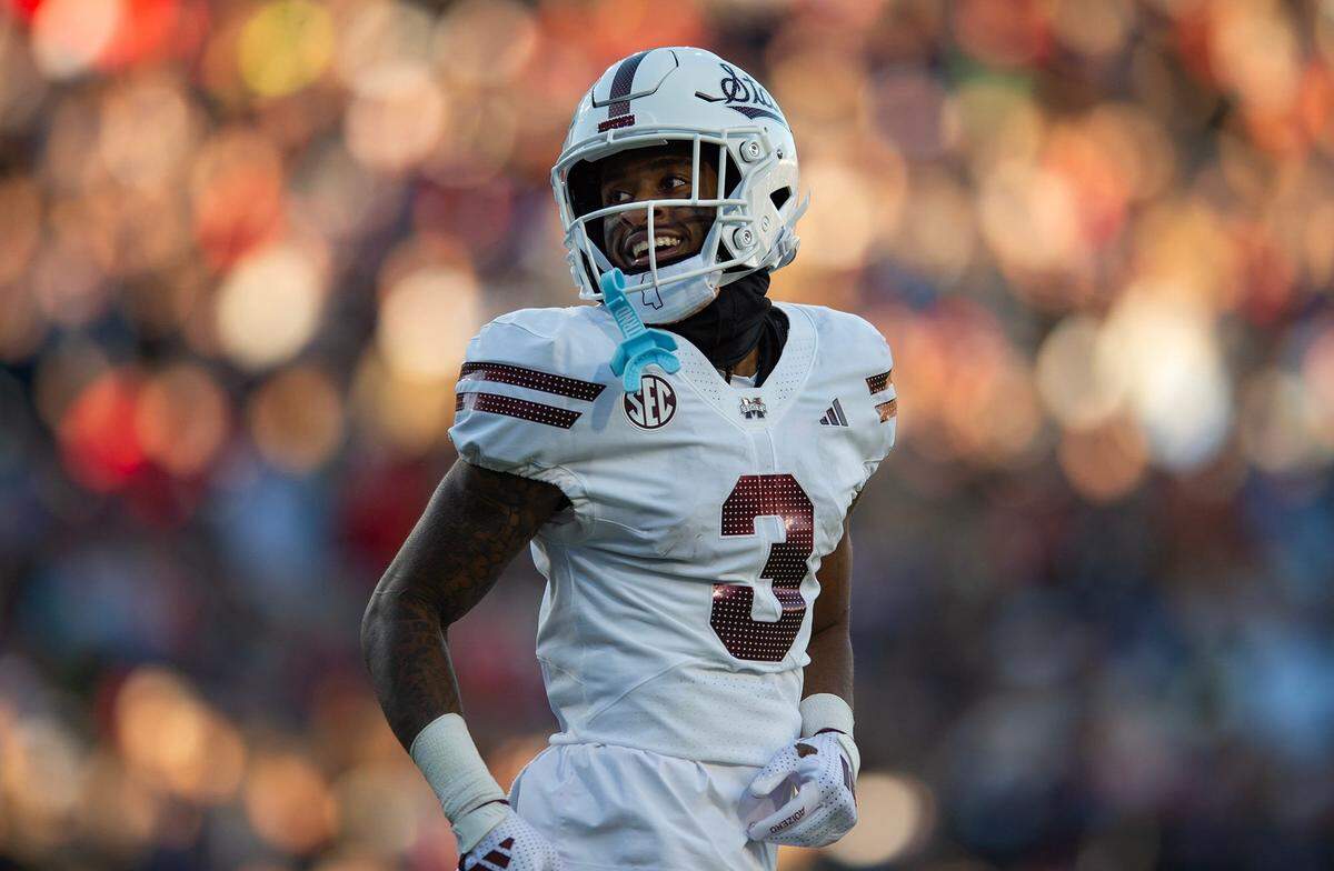 Mississippi State's wide receiver Kevin Coleman Jr. (3) smiles after scoring a touchdown during the Egg Bowl game against Mississippi at Vaught-Hemingway Stadium on Friday, Nov. 29, 2024.