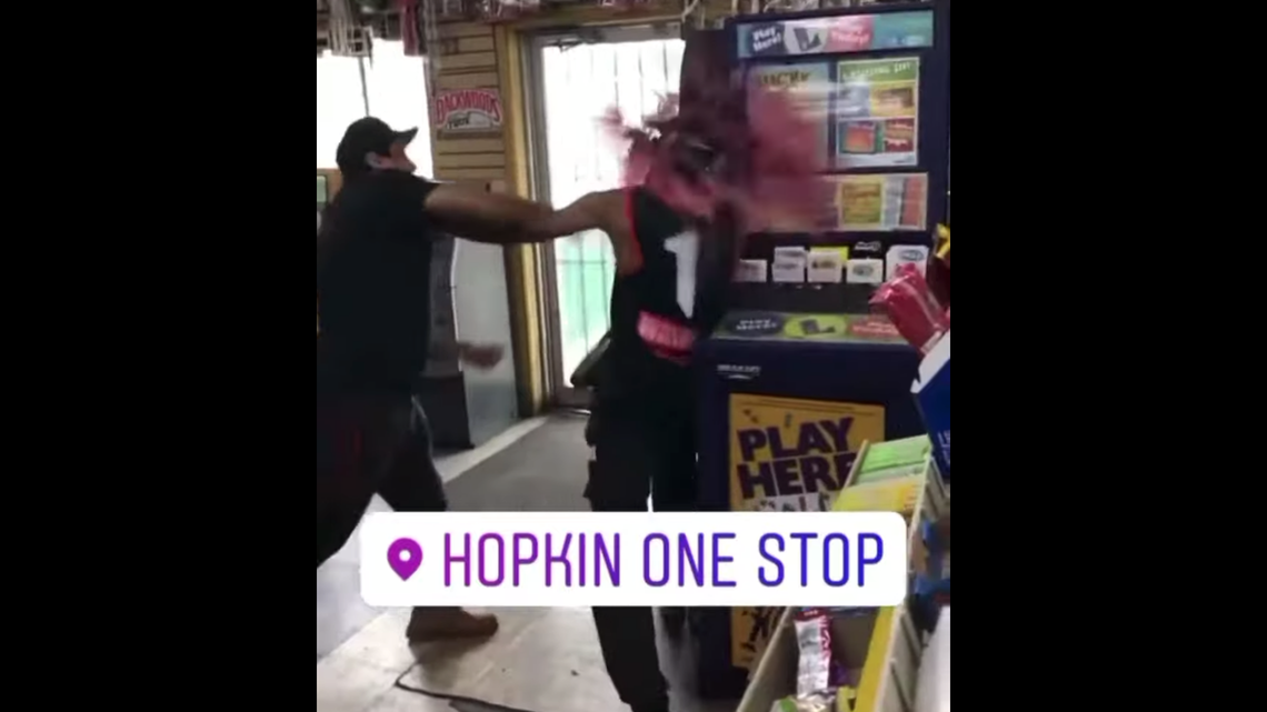 Video shows a Louisiana gas station clerk hit an upset customer in the head with a wine bottle during an argument. He was later arrested.