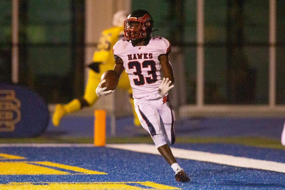 Hancock’s Destin Coleman scores a touchdown during a game against St. Martin at Joe Barlow Stadium in St. Martin on Friday, Sept. 30, 2022.
