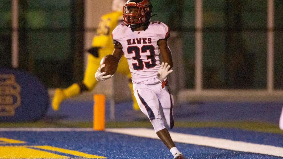 Hancock’s Destin Coleman scores a touchdown during a game against St. Martin at Joe Barlow Stadium in St. Martin on Friday, Sept. 30, 2022.