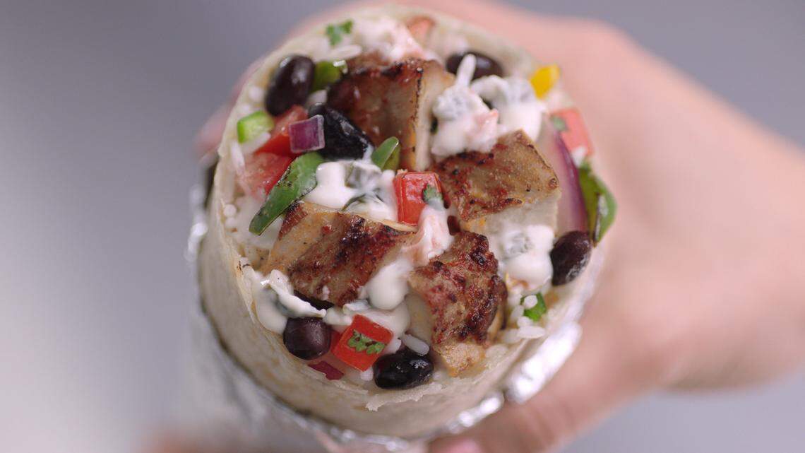 Coast residents will be able to order the popular Chipolte burritos and other favorites next spring.