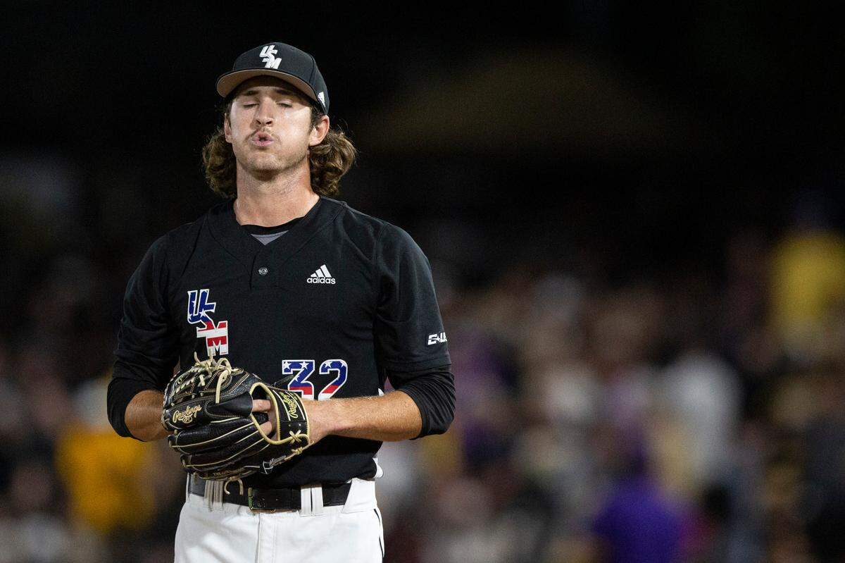 Southern Miss pitcher Garrett Ramsey prepares to throw a pitch against LSU in the bottom of the ninth in an attempt to win Game Four of NCAA Regionals against Southern Miss at Pete Taylor Park in Hattiesburg on Saturday, June 4, 2022.