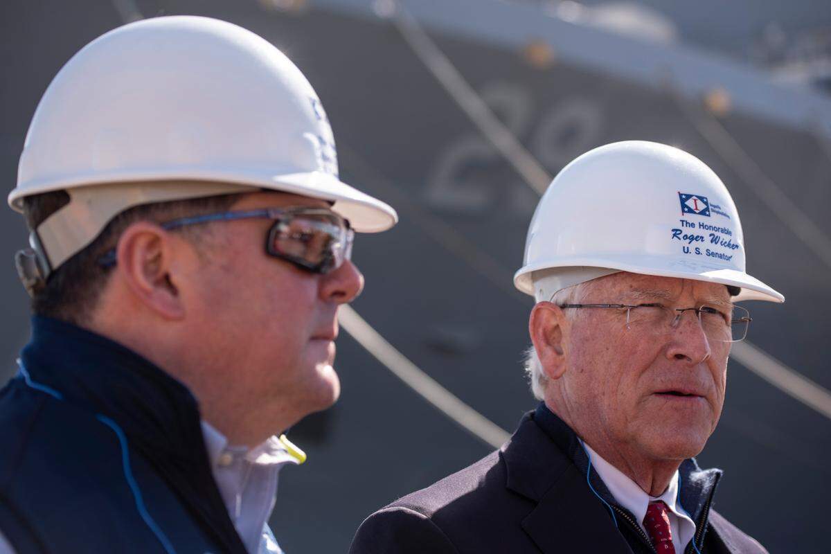 U.S. Rep. Steven Palazzo, left, and U.S. Sen. Rodger Wicker speak to the press in front of the USS Richard M. McCool Jr. (LPD-29) at Ingalls Shipbuilding in Pascagoula on Wednesday, Jan. 26, 2022.