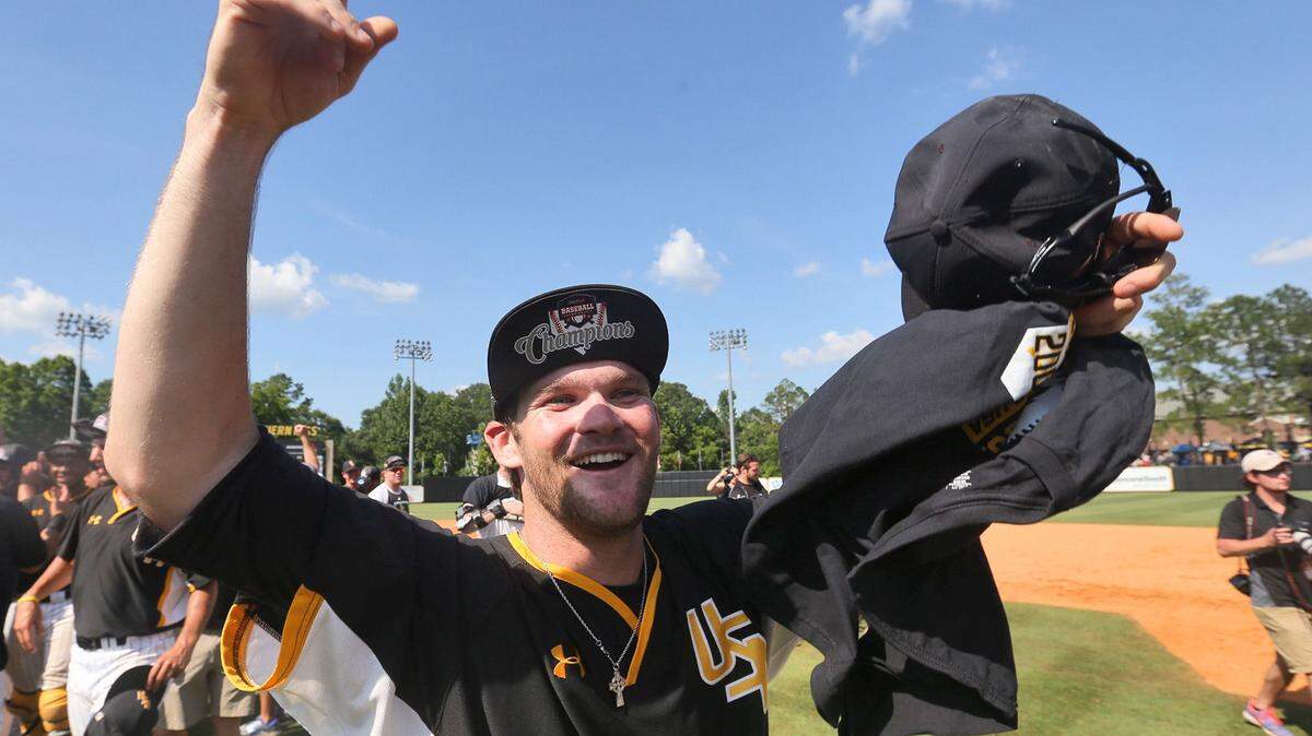 JOHN FITZHUGH/SUN HERALD 
 Southern Miss pitcher Connor O'Brien celebrates winning the C-USA championship game over Rice on Sunday May 29, 2016 at Pete Taylor Park in Hattiesburg.