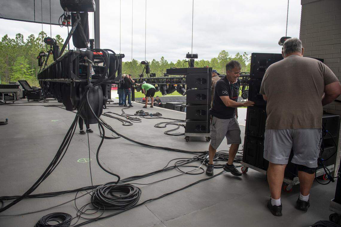Workers prep the stage area for the opening of The Sound Amphitheater in Gautier on Thursday, April 11, 2024. The new venue will host its first concert, KC and The Sunshine Band, on Friday, April 12.