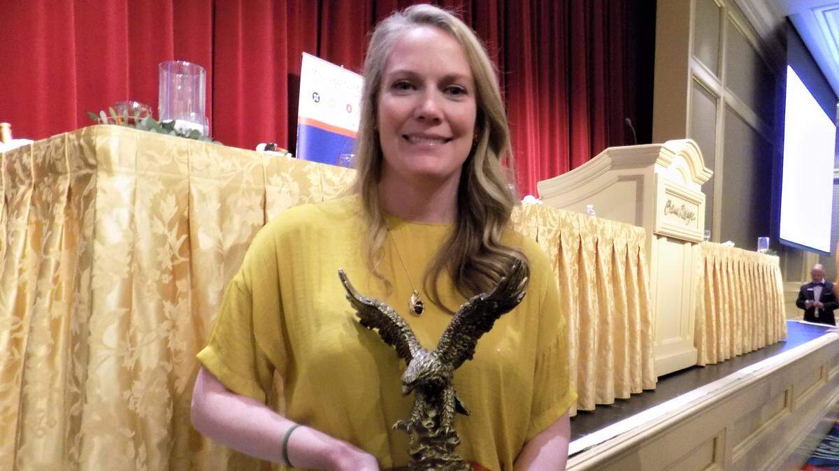 Rachel Barajas accepted the Spirit of the Coast award Tuesday in honor of her husband, Arturo Barajas, who died last month. He founded Mosaic Tapas restaurant in Ocean Springs and other businesses on the Coast.