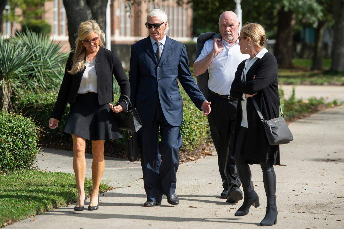 From left, Caty Mahoney Hulett, Biloxi attorney Michael Cavanaugh, Bobby Mahoney and Stacy Mahoney Schmidt leave the Dan M. Russell Federal Courthouse in Gulfport on Monday, Nov. 18, 2024, after Mary Mahoney’s and Anthony Cvitanovich are sentenced in a federal case involving mislabeling seafood. Bobby Mahoney, a co-owner of Mary Mahoney’s, was not charged in the case.