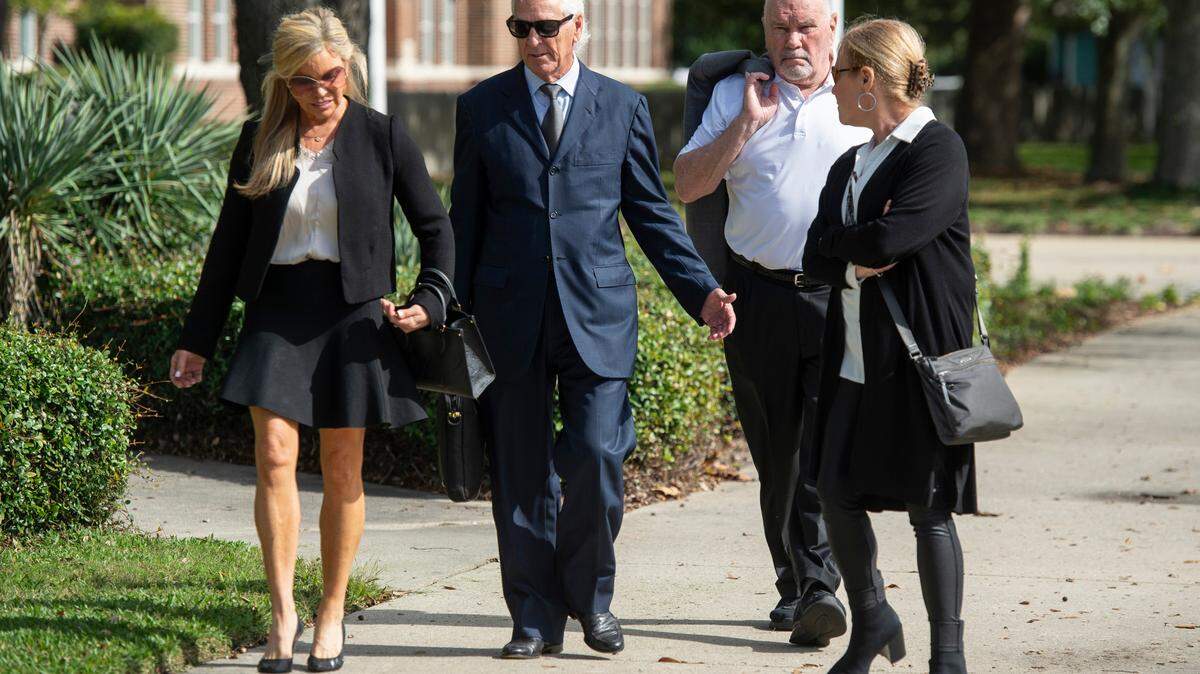 From left, Caty Mahoney Hulett, Biloxi attorney Michael Cavanaugh, Bobby Mahoney and Stacy Mahoney Schmidt leave the federal courthouse in Gulfport on Monday, Nov. 18, 2024, after Mary Mahoney’s and Anthony Cvitanovich are sentenced in a federal case involving mislabeling seafood. Bobby Mahoney, a co-owner of Mary Mahoney’s, was not charged in the case.