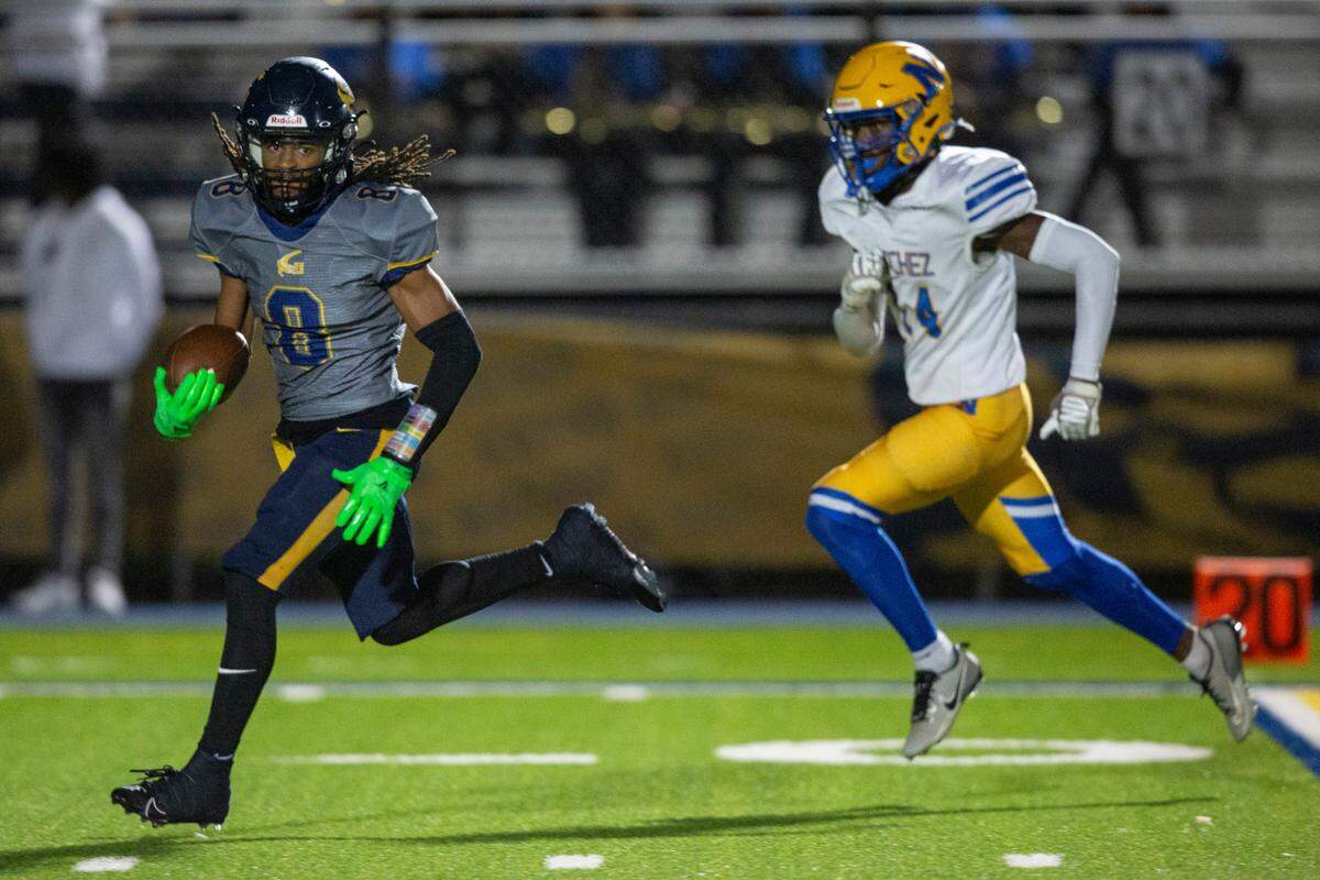 Gautier wide receiver Kanien Rush runs the ball during a 5A playoff game between Gautier and Natchez at Gautier High School on Friday, Nov. 15, 2024.