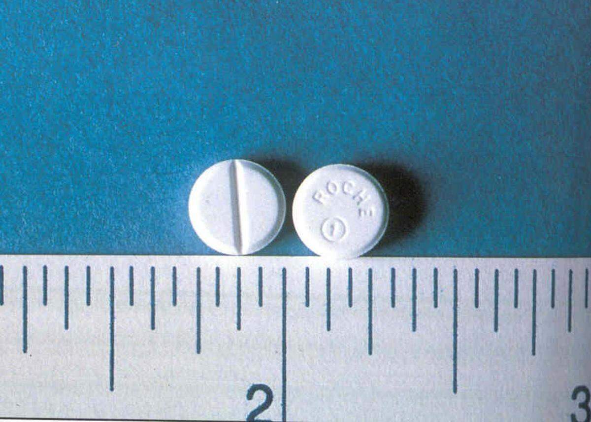 The size of a Rohypnol pill is shown.