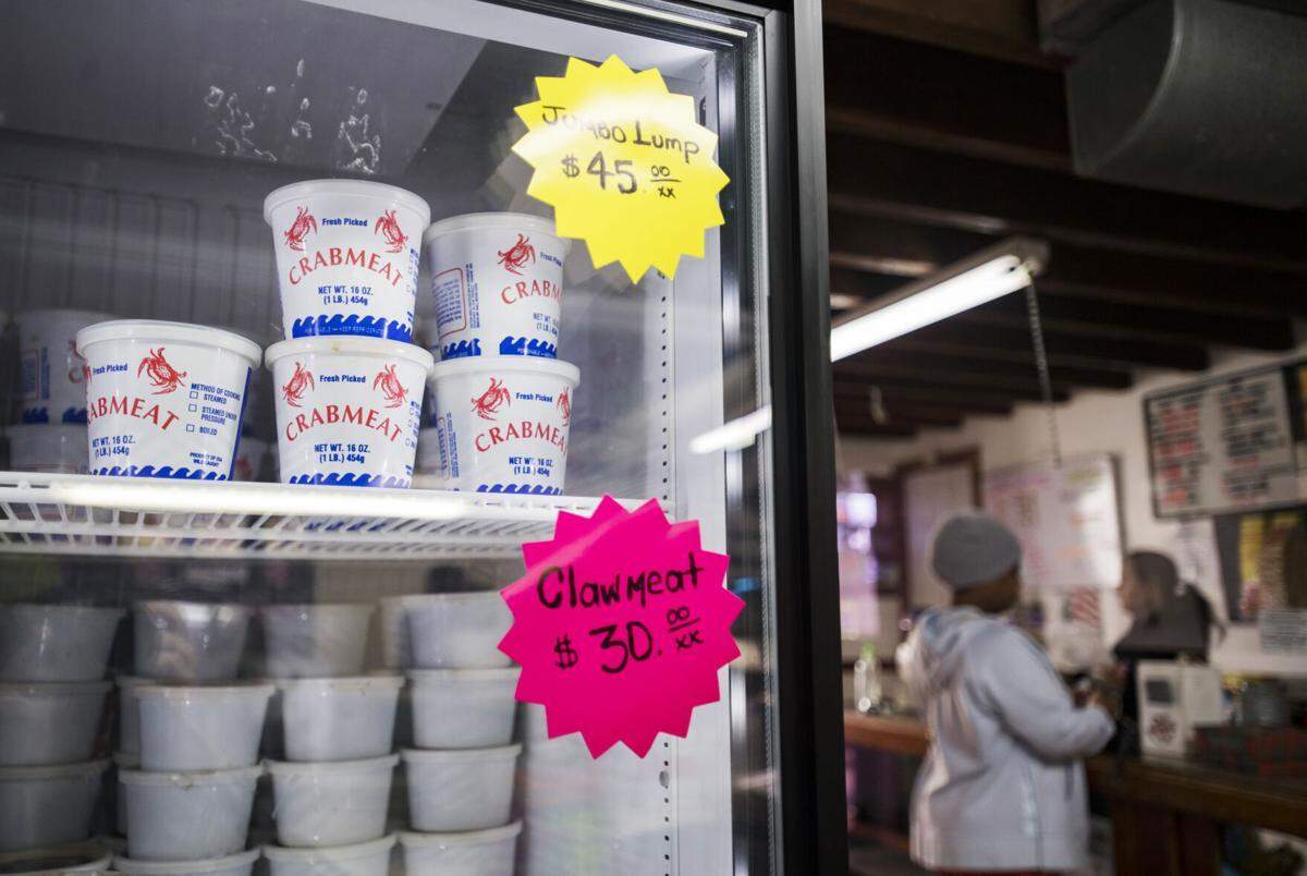 Containers of jumbo lump crab meat are for sale Friday, January 21, 2022, at Chez Francois Seafood in Lafayette, La.