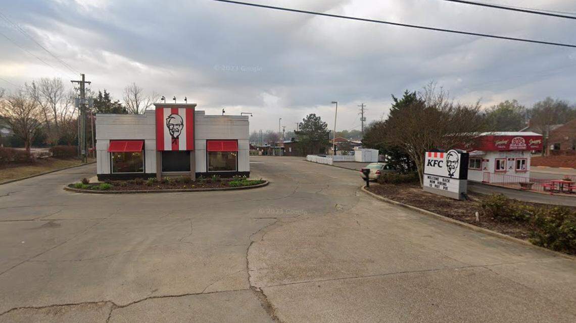 Two teens struggled over a gun during a fight at KFC, causing it to fire, police in Mississippi say. Both were arrested and charged.