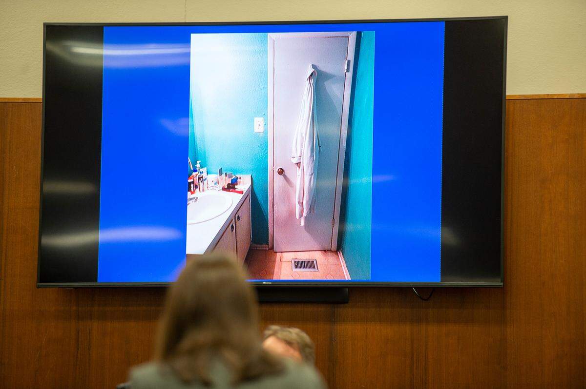 A photo of a bathroom and bathrobe inside Cliff Kirkland’s house is shown as evidence in the trial of Cliff Kirkland in Harrison County Circuit Court in Biloxi on Monday, May 16, 2022.