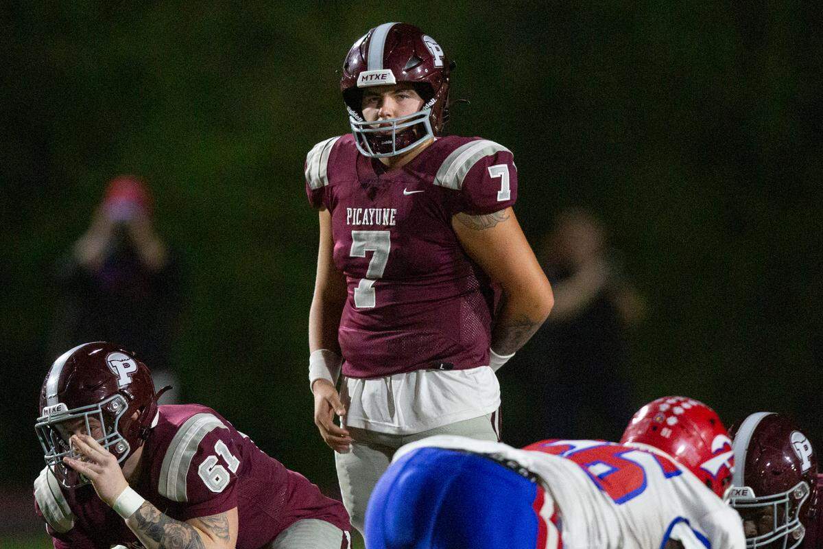 Picayune quarterback Brady Robertson prepares for the snap during a playoff game at Lee-Triplett Stadium in Picayune on Friday, Nov. 17, 2023.