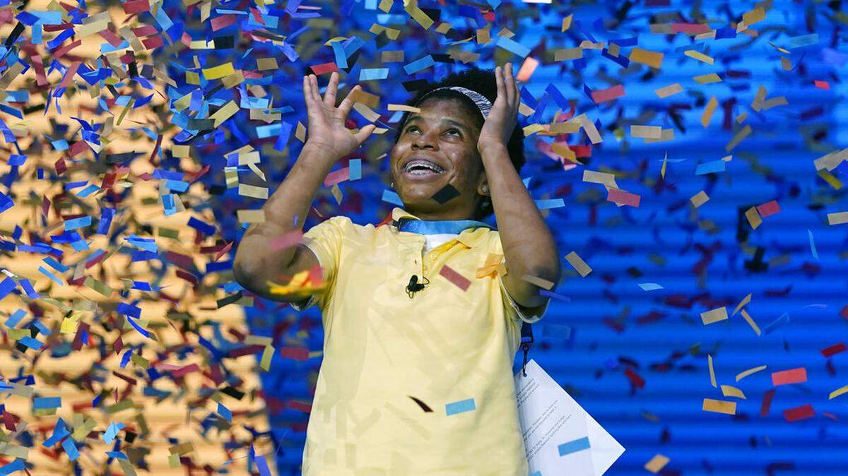 Zaila Avant-garde, 14, from Harvey, Louisiana is covered with confetti as she celebrates winning the finals of the 2021 Scripps National Spelling Bee on Thursday.