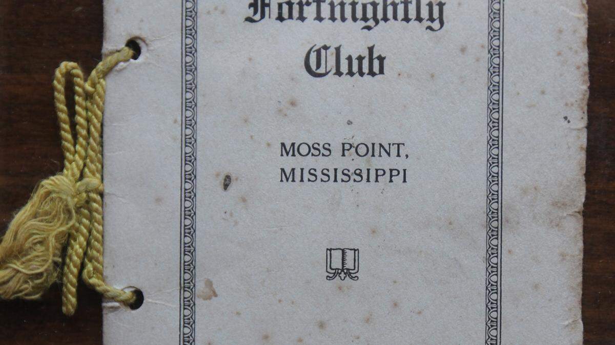 JOHN FITZHUGH/SUN HERALDThe oldest yearbook of the Fortnightly Club in Moss Point was not made until five years after their formation.
