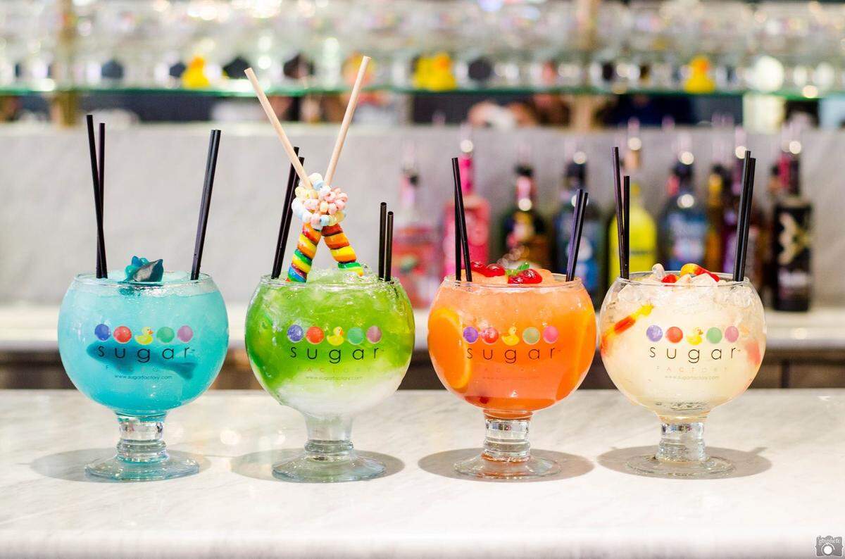 The colorful drinks at Sugar Factory come with candy and both spiked and non-alcoholic versions.