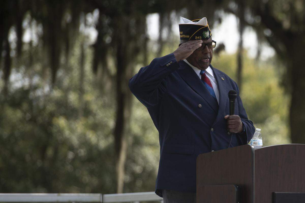 Mitch Ellerby salutes after speaking during a Memorial Day ceremony at Biloxi National Cemetery in Biloxi on Monday, May 26, 2025.