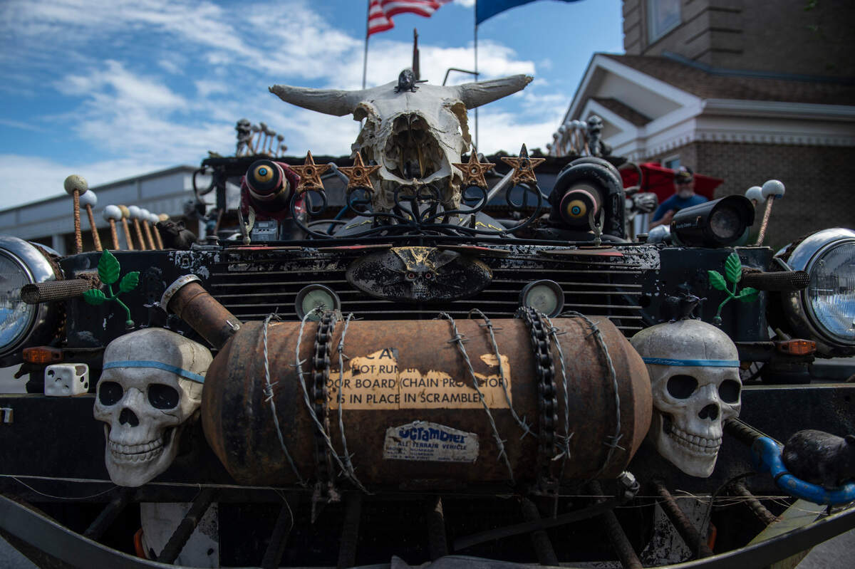 Rat Rod, a car covered in 28 plastic rats as well as various skulls and a toilet, during View the Cruise on Sunday, Oct. 3, 2021. Gary Sellers, of Tioga, Louisiana, created the car, slowly adding items over the last four years.
