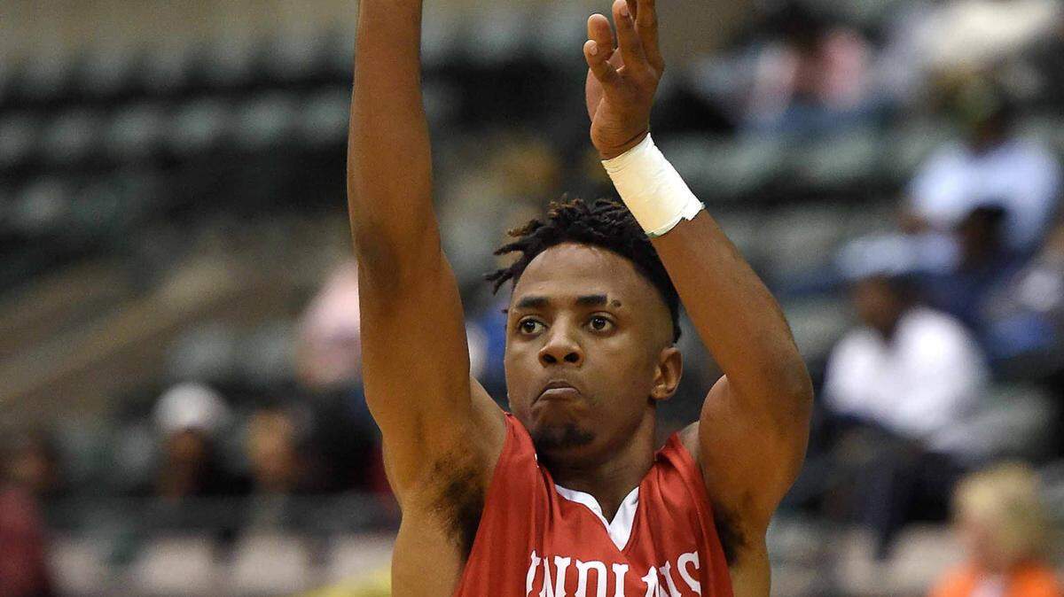 CHRIS TODD/SPECIAL TO THE SUN HERALD 
 Biloxi's Martell Turner (2) shoots a trey from long range against Starkville on Saturday, March 5, 2016, in the MHSAA state basketball tournament quarterfinals at the Mississippi Coliseum in Jackson, Miss.