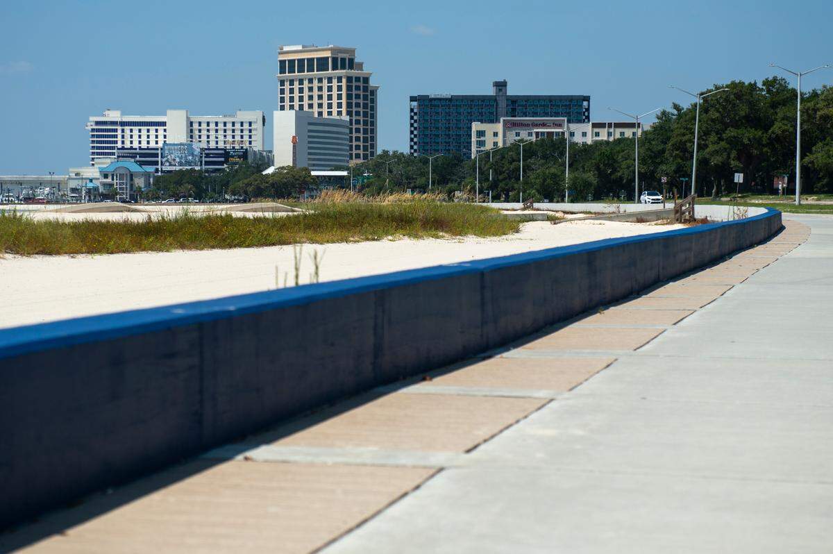A boardwalk and seawall similar to what was under construction in Pass Christian lines Highway 90 in Biloxi on Wednesday, Aug. 21, 2024.