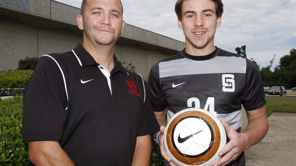 TIM ISBELL/SUN HERALD 
 St. Stanislaus soccer coach Ryan Joiner and Dustin Bosch led the Rockachaws past Bay High 2-1 in overtime on Friday night.
