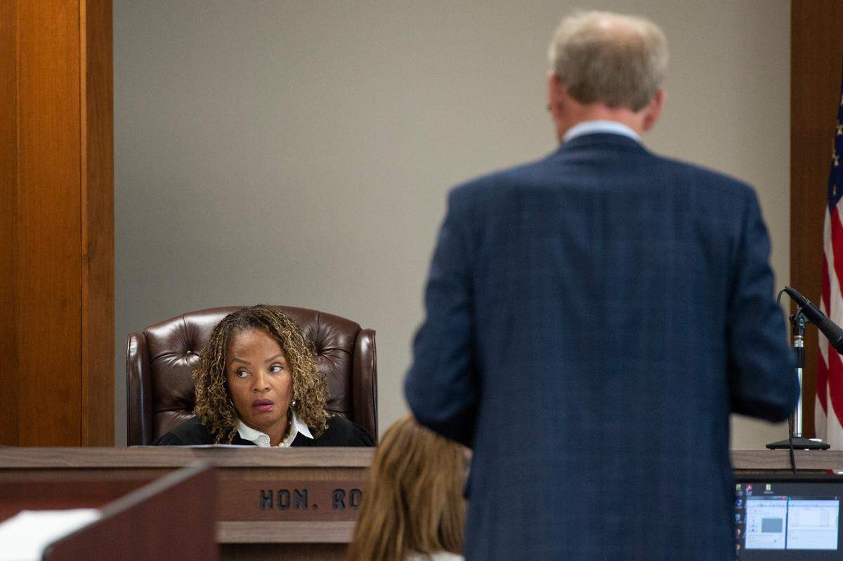 Judge Robin Midcalf speaks to attorneys for Jennifer Foster and Ryan Brashear during a trial at the Harrison County Courthouse in Biloxi on Tuesday, March 28, 2023.