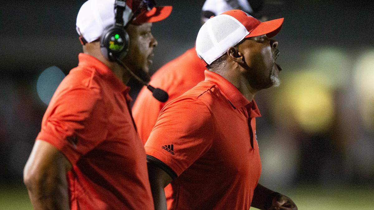 Harrison Central’s head coach Tony Myers yells at his players from the sidelines during a game against Oak Grove at Milner Stadium in Gulfport on Friday, Aug. 26, 2022.