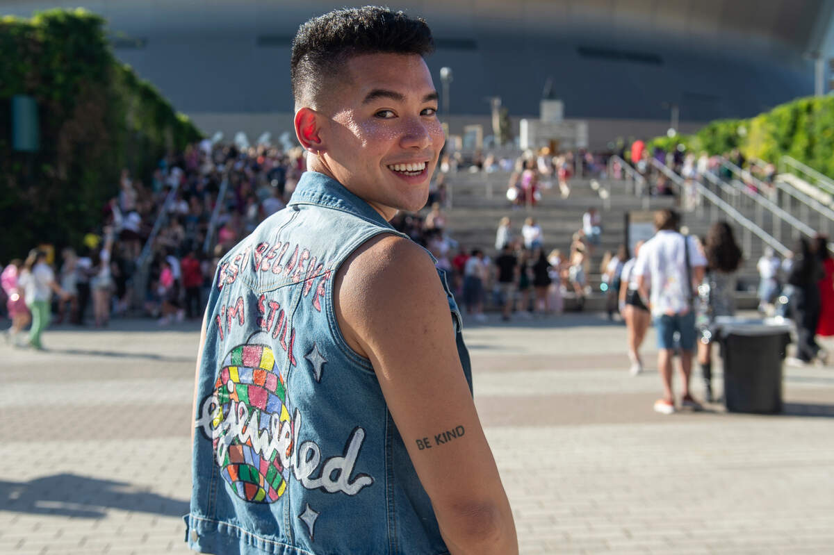 Tin Nguyen, of San Francisco, Ca., shows off his Eras Tour outfit outside the Cesars Superdome in New Orleans on Friday, Oct. 25, 2024, before Taylor Swift’s Eras Tour performance that night.