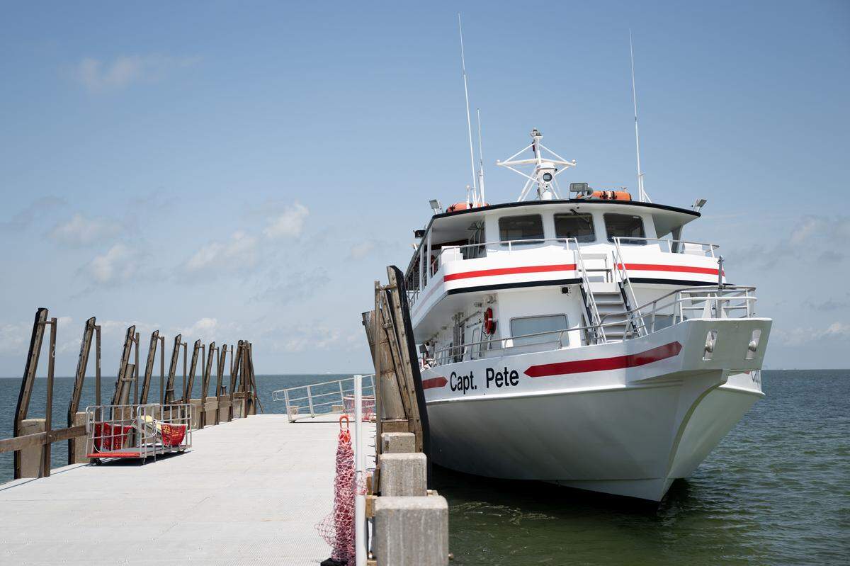 The Capt. Pete ferry is docked at Ship Island on Wednesday.