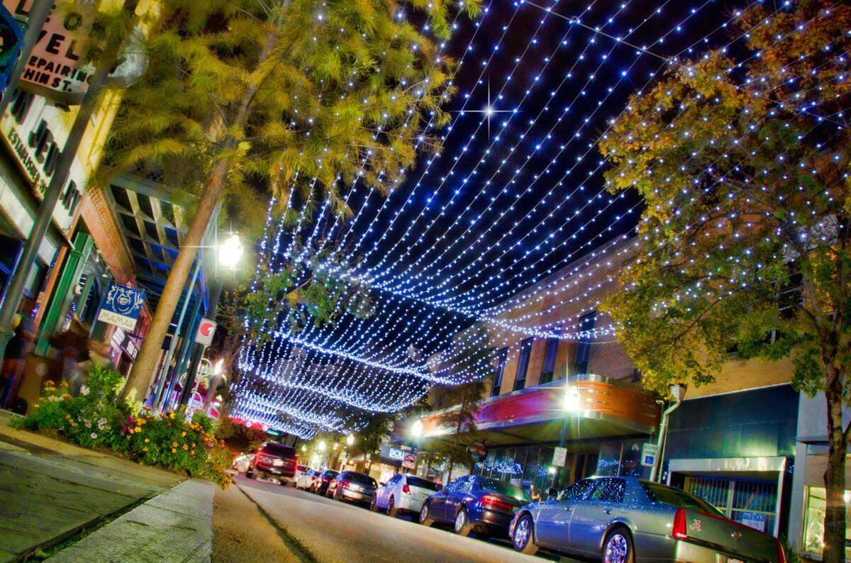 Lights stretch over Dauphin Street in Mobile, creating a fun atmosphere for those who will ride Amtrak to the city for dining, shopping and sightseeing.