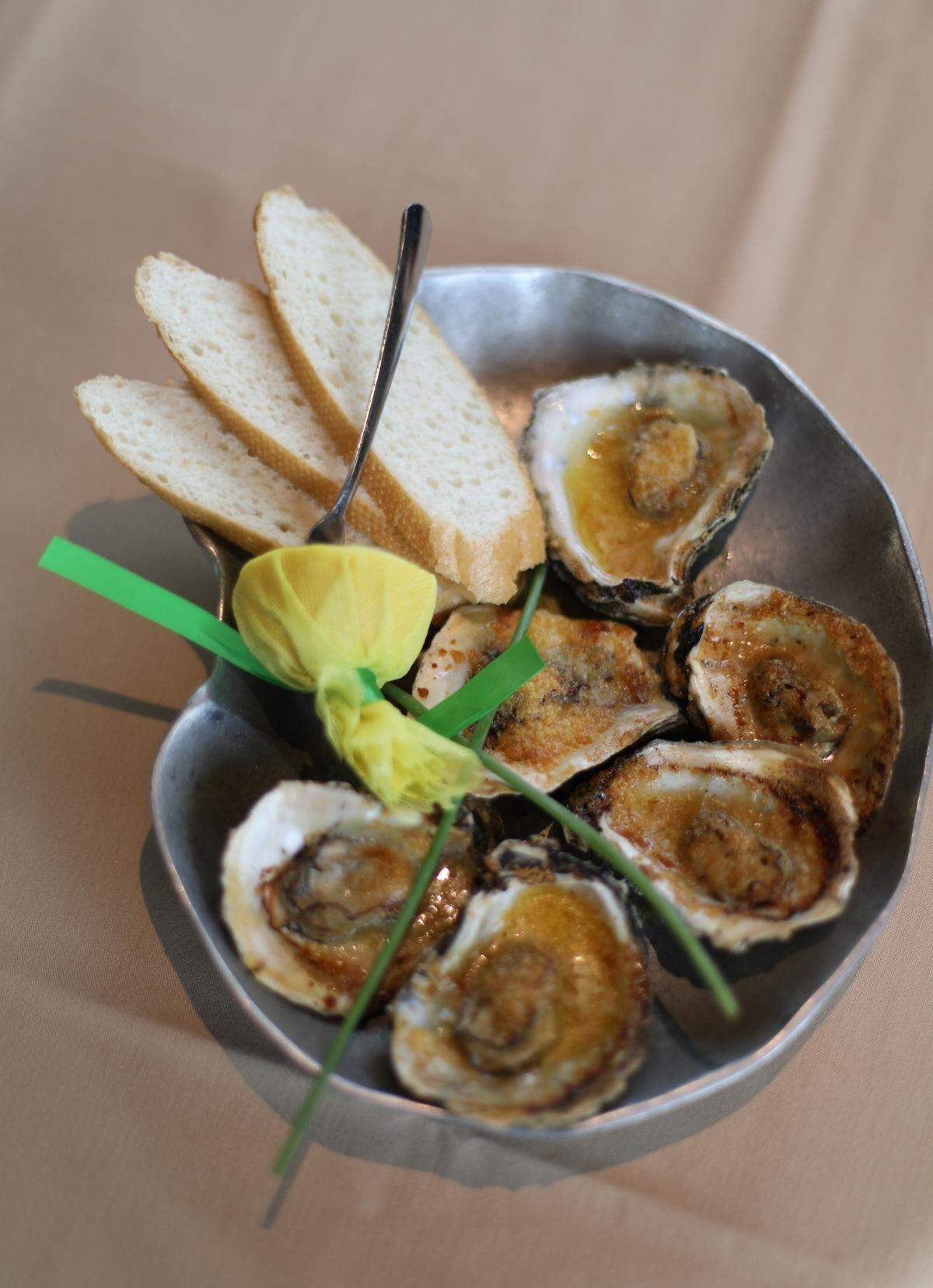 Chargrilled oysters at Blue Bayou steak house inside Silver Slipper Casino in Hancock County.