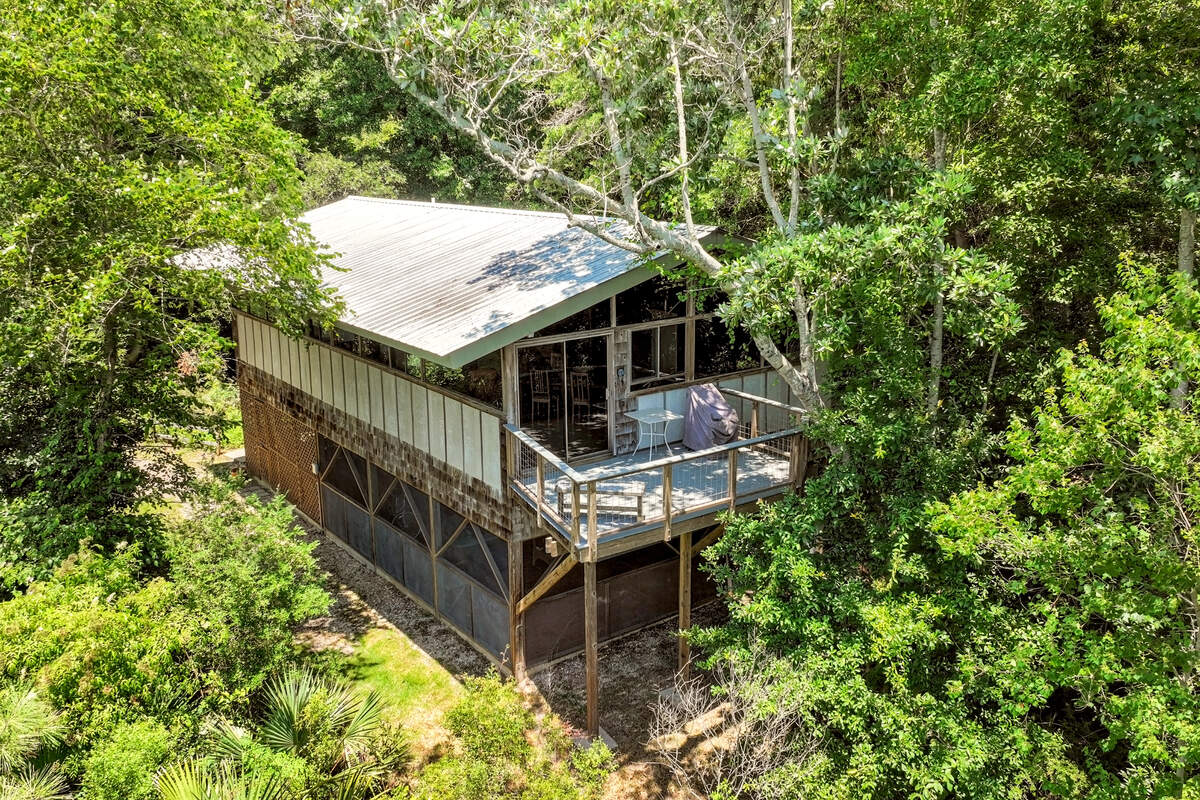 This Ishee house on Davis Bayou in Ocean Springs is on the market for $450,000. It features three bedrooms, two baths and a charm imbued with the builder/designer’s unique style. He built the house in 1982 for his daughter.