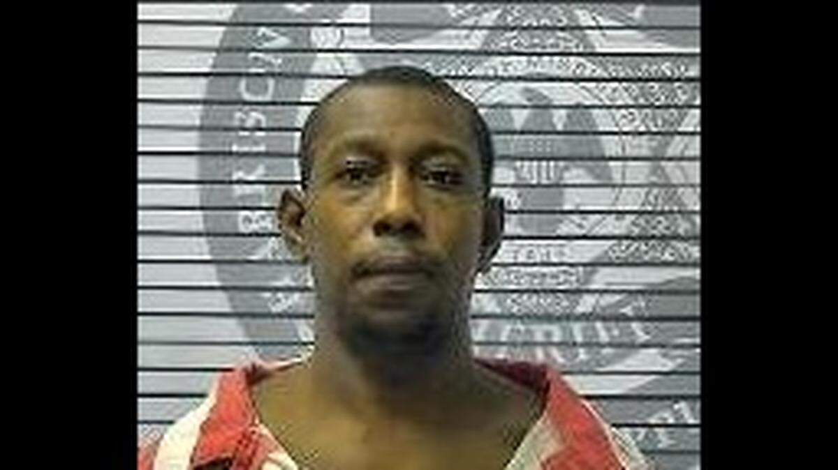 Frederick Jonathan Jenkins is accused of raping a woman at his home and was wanted on a cocaine possession charge in Gulfport.