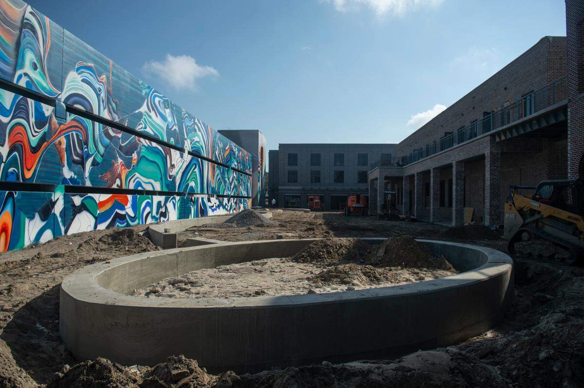A mural by Douglas Hoekzema, also known as Hoxxoh, decorates what will be the new OS 1515 development in downtown Ocean Springs on Tuesday, Oct. 29, 2024.