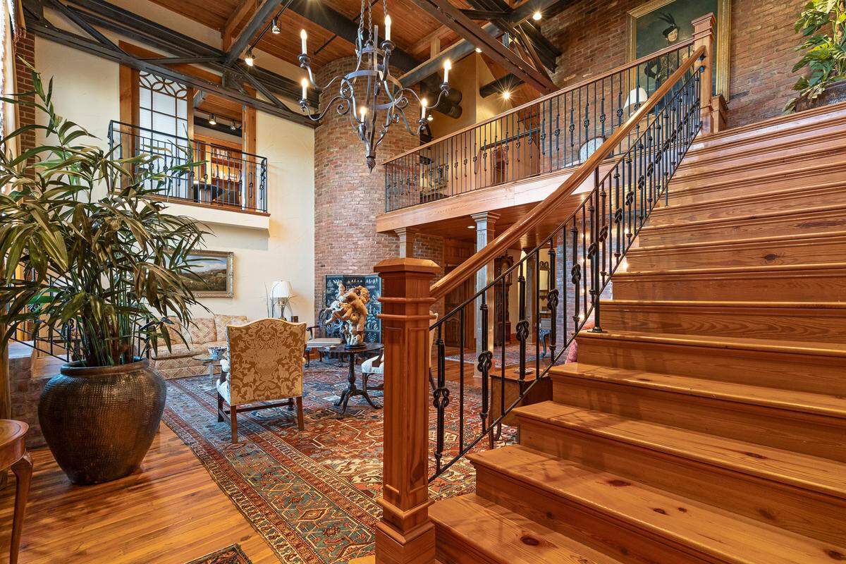 The private loft includes three bedrooms and a chef’s kitchen for entertaining guests.