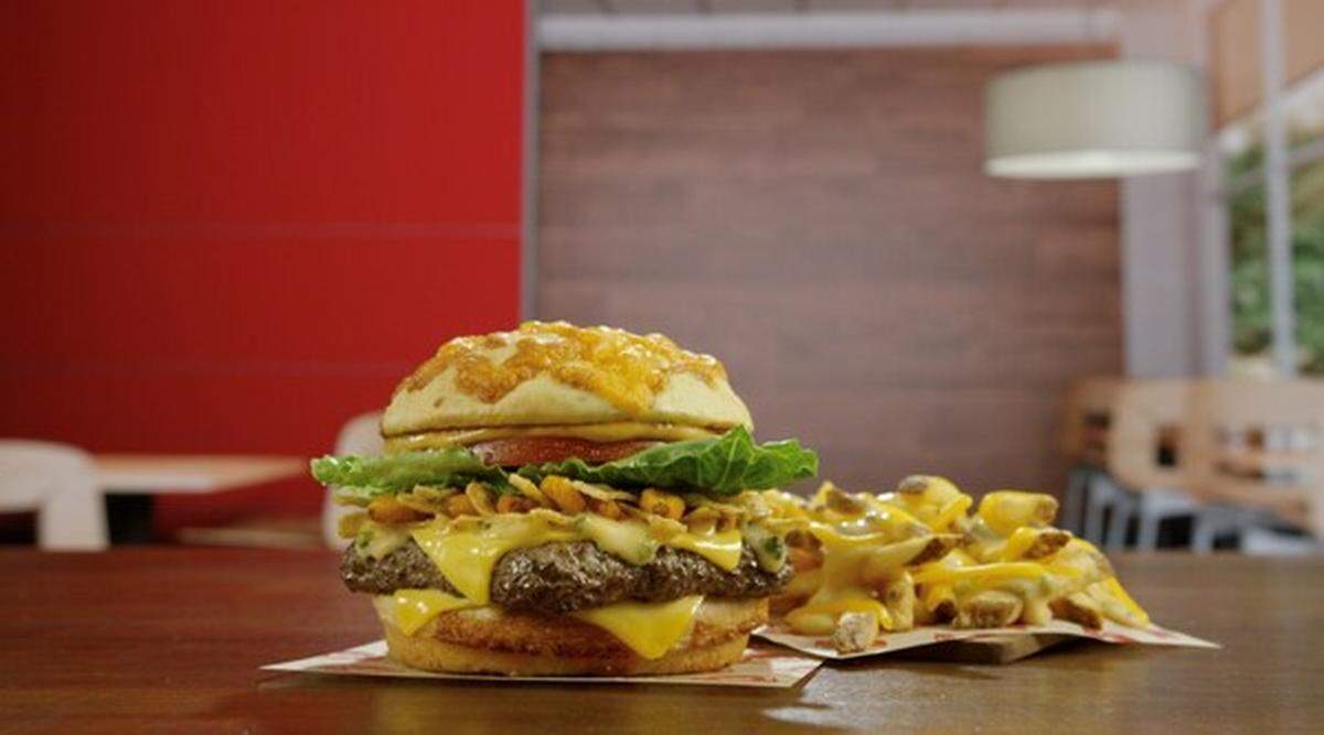 Score Big on Flavor with Wendy’s Game-Changing Cheesy Duo: The Loaded Nacho Cheeseburger and Queso Fries.